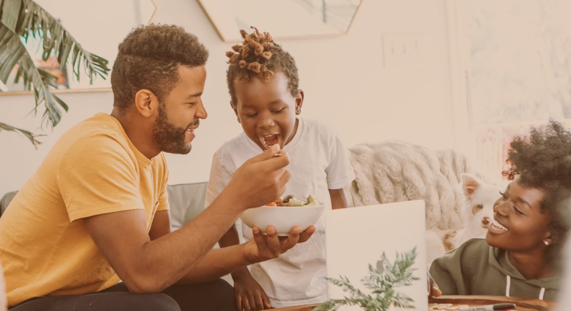 happy family eating breakfast