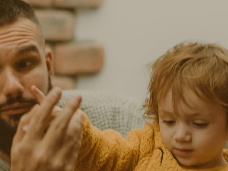 young dad with toddler